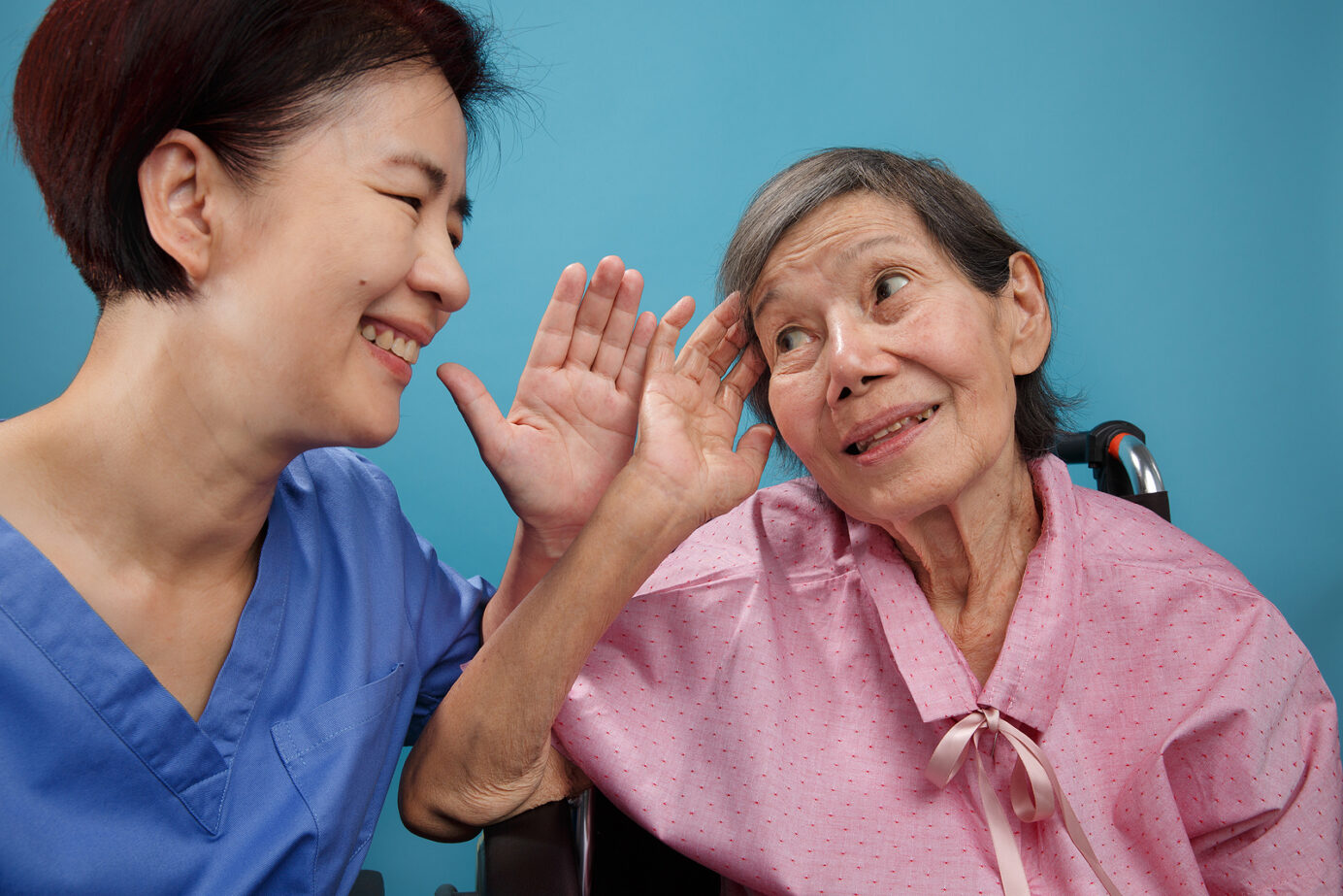 Senior women is listening to nurse talk